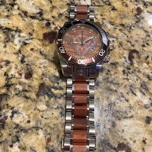 Invicta Pro Diver men’s quartz watch with a wood grain dial model 0164.